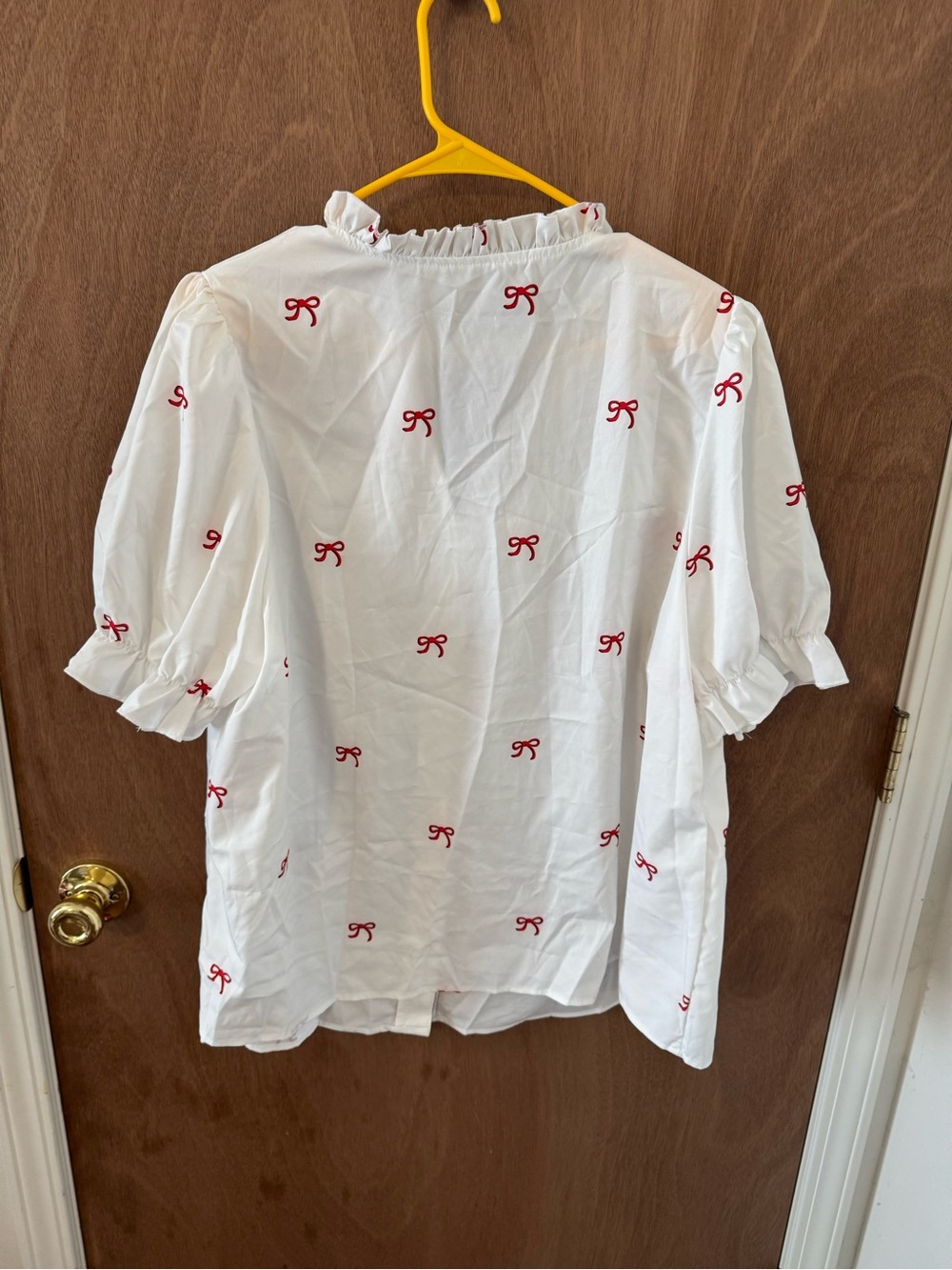 White Blouse with Red Bow Embroidery